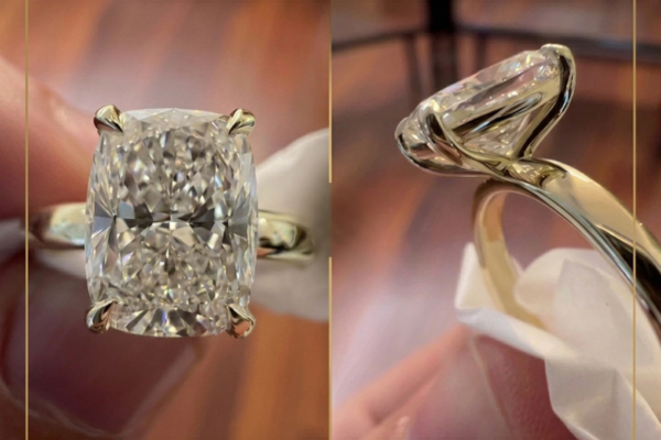 Close-up of a radiant cut lab grown diamond solitaire ring in a four-prong setting, showing the top view and side profile of the cathedral-style mounting.